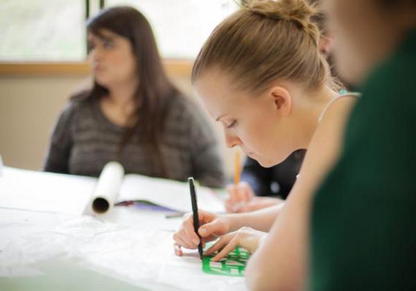 Students working inside a classroom