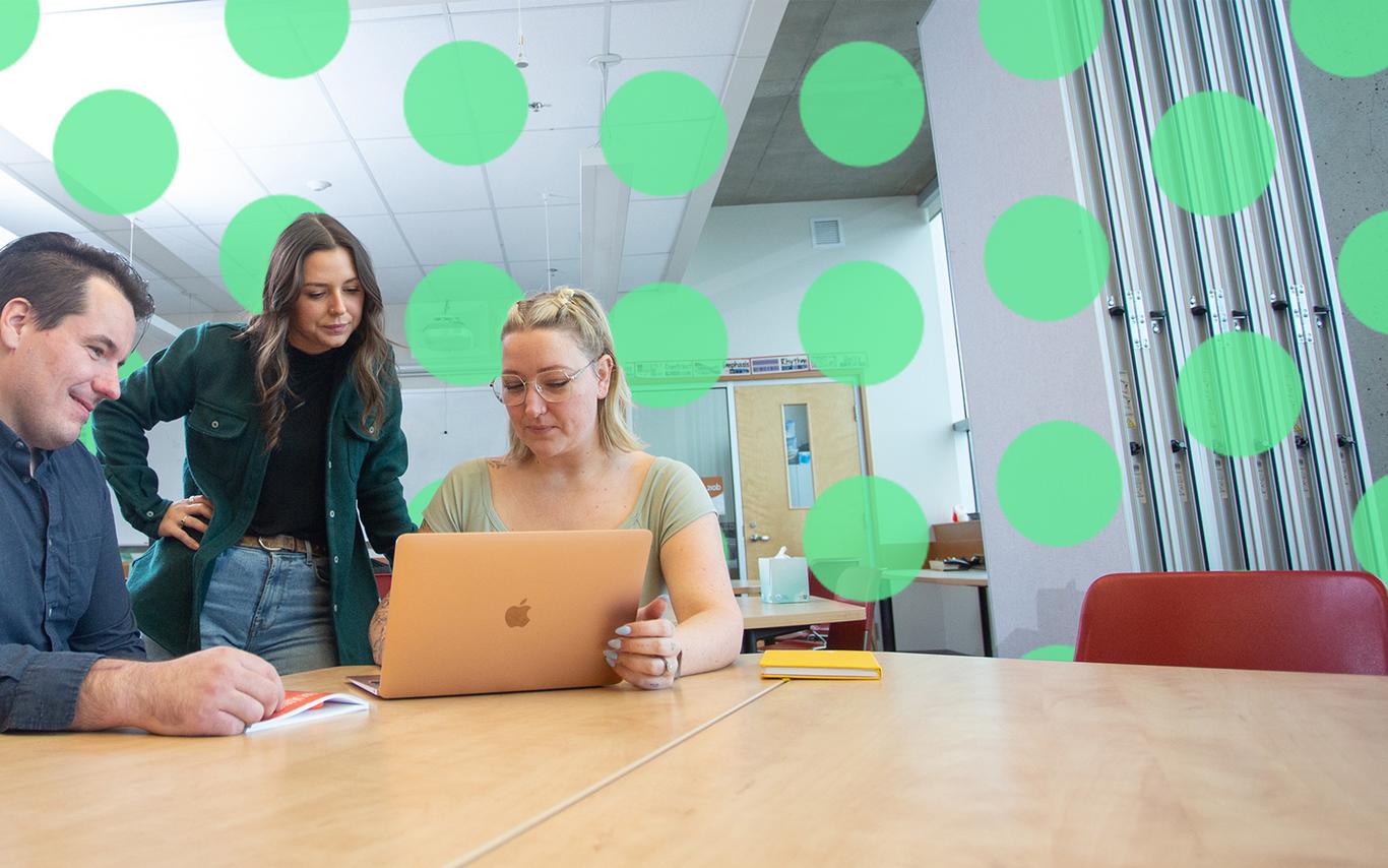 Students working at a table together